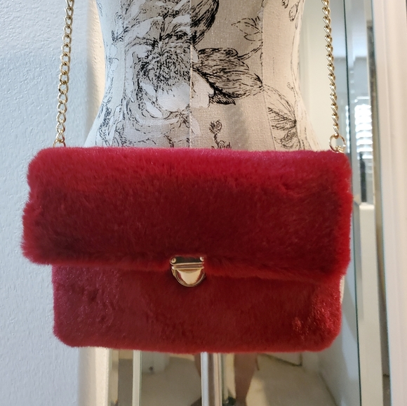red faux fur purse